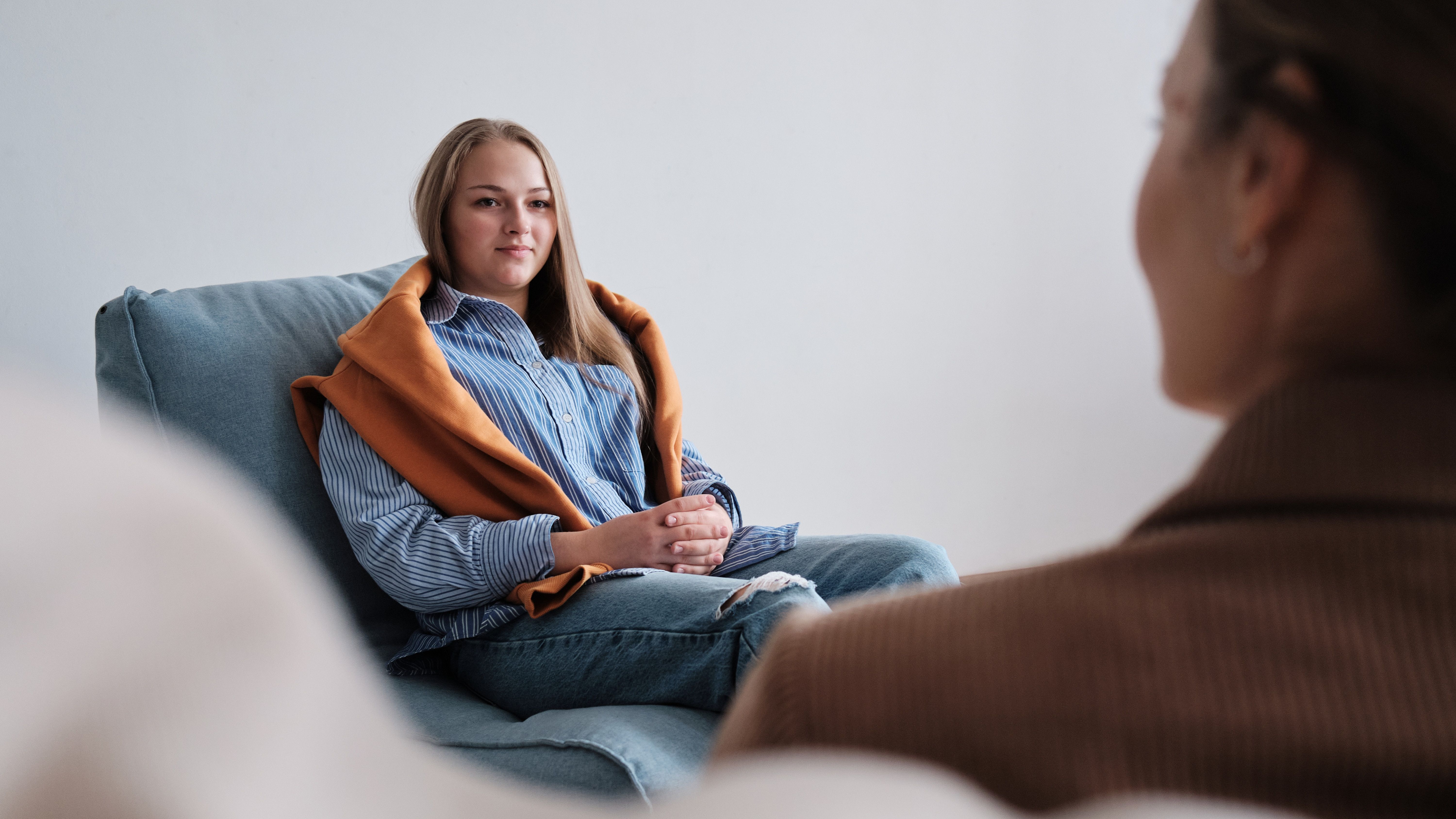 person in a psychologist chair